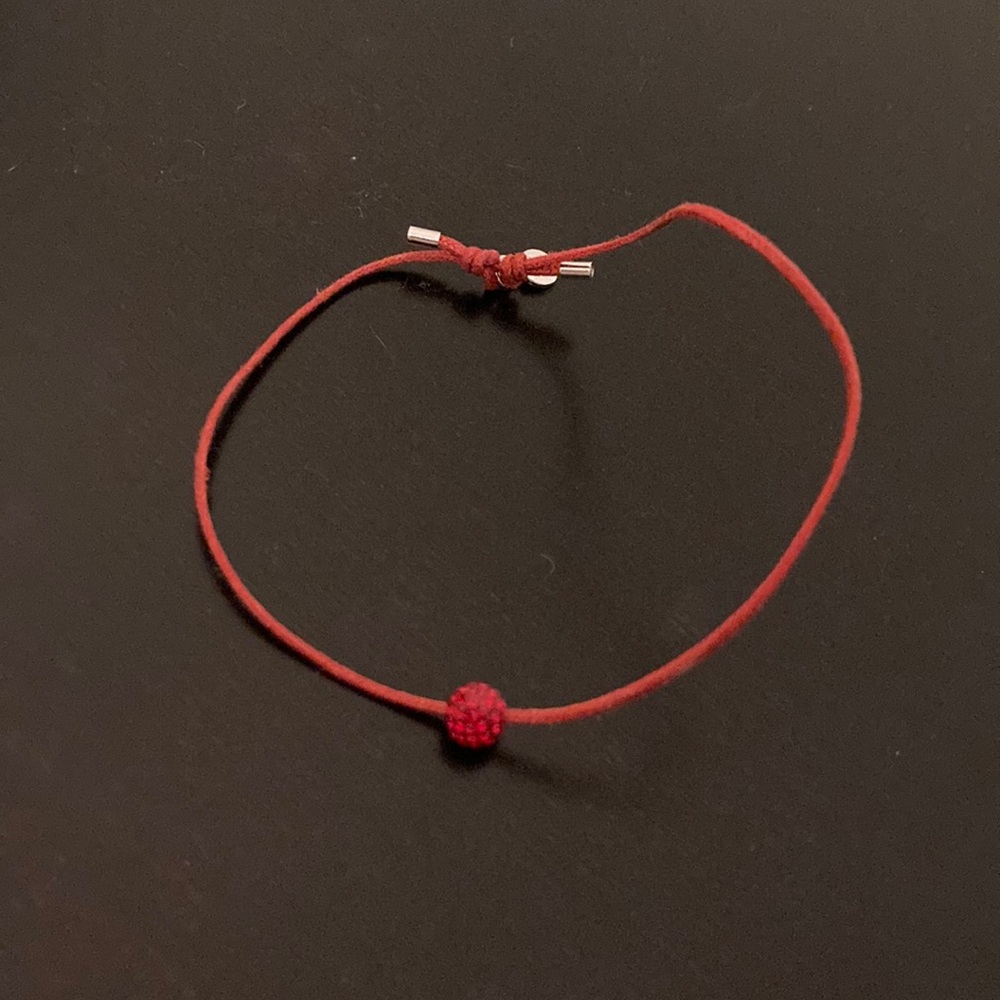 Red crystal disco ball bracelet.